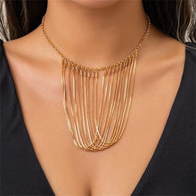 Gold Tassel: Snake Bone Chain Necklace