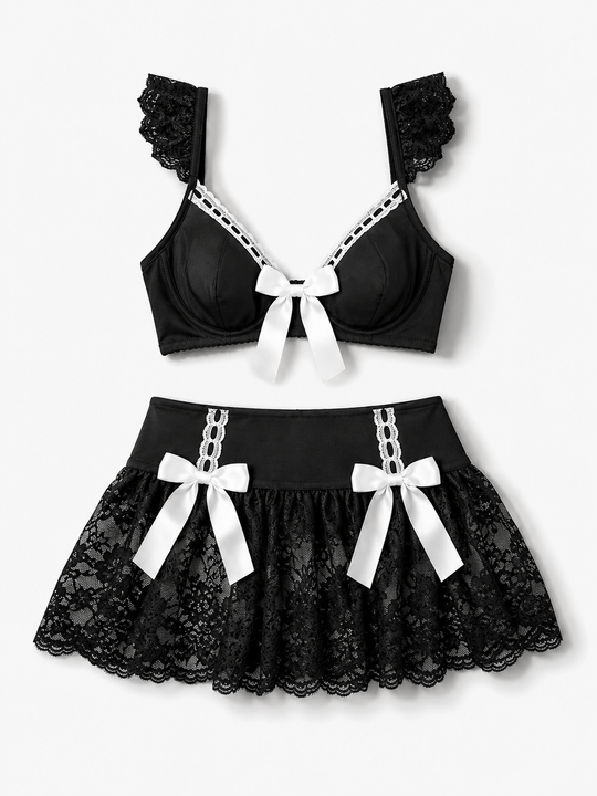 Black lace 3-piece babydoll set with underwired bra, ruffled straps, sheer mesh mini-skirt, and white satin bows.